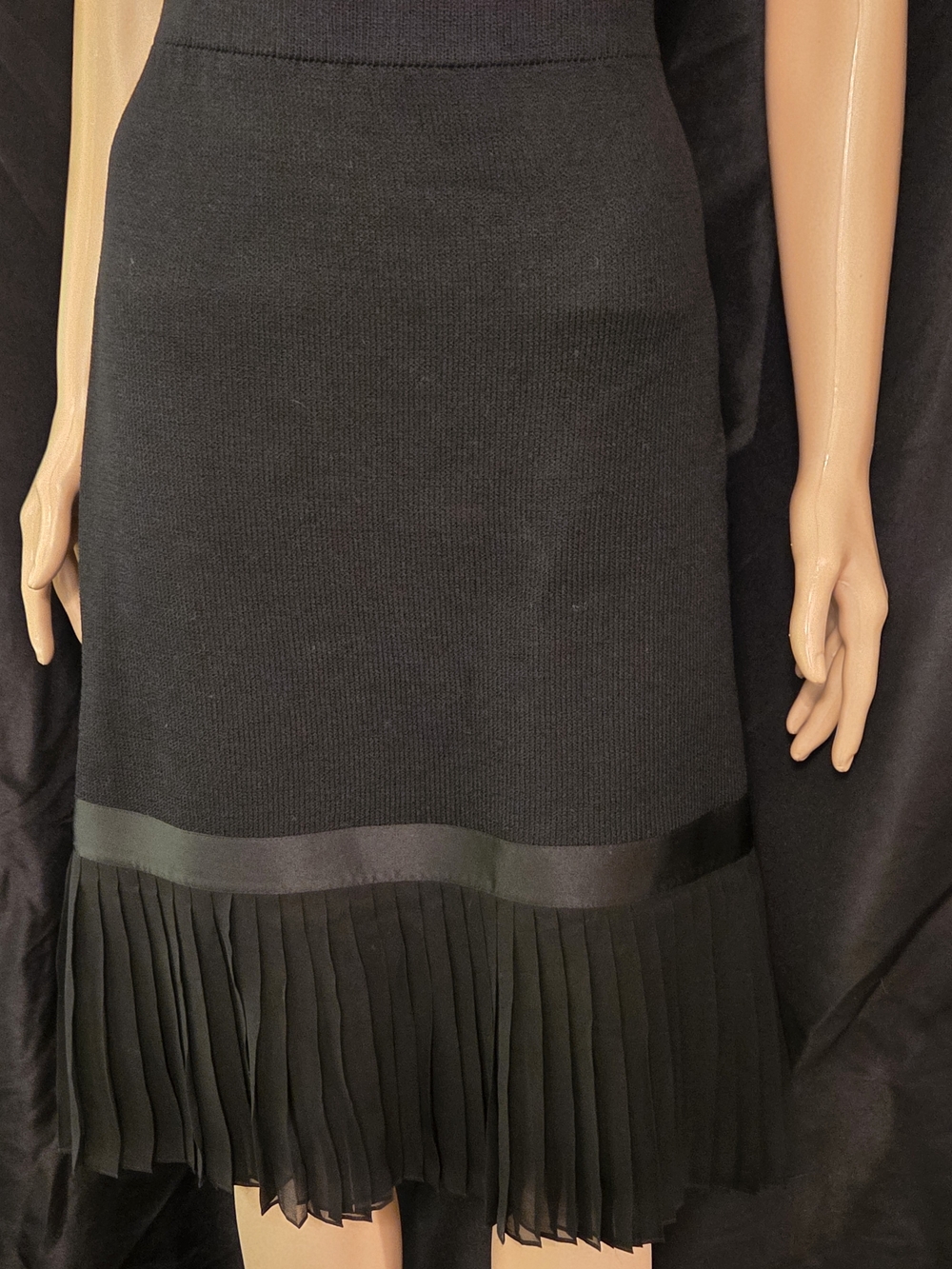 St. John Black Knit Midi Skirt with Pleated Hem and Satin Silk Trim